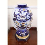 A pair of Edwardian blue and white china vases