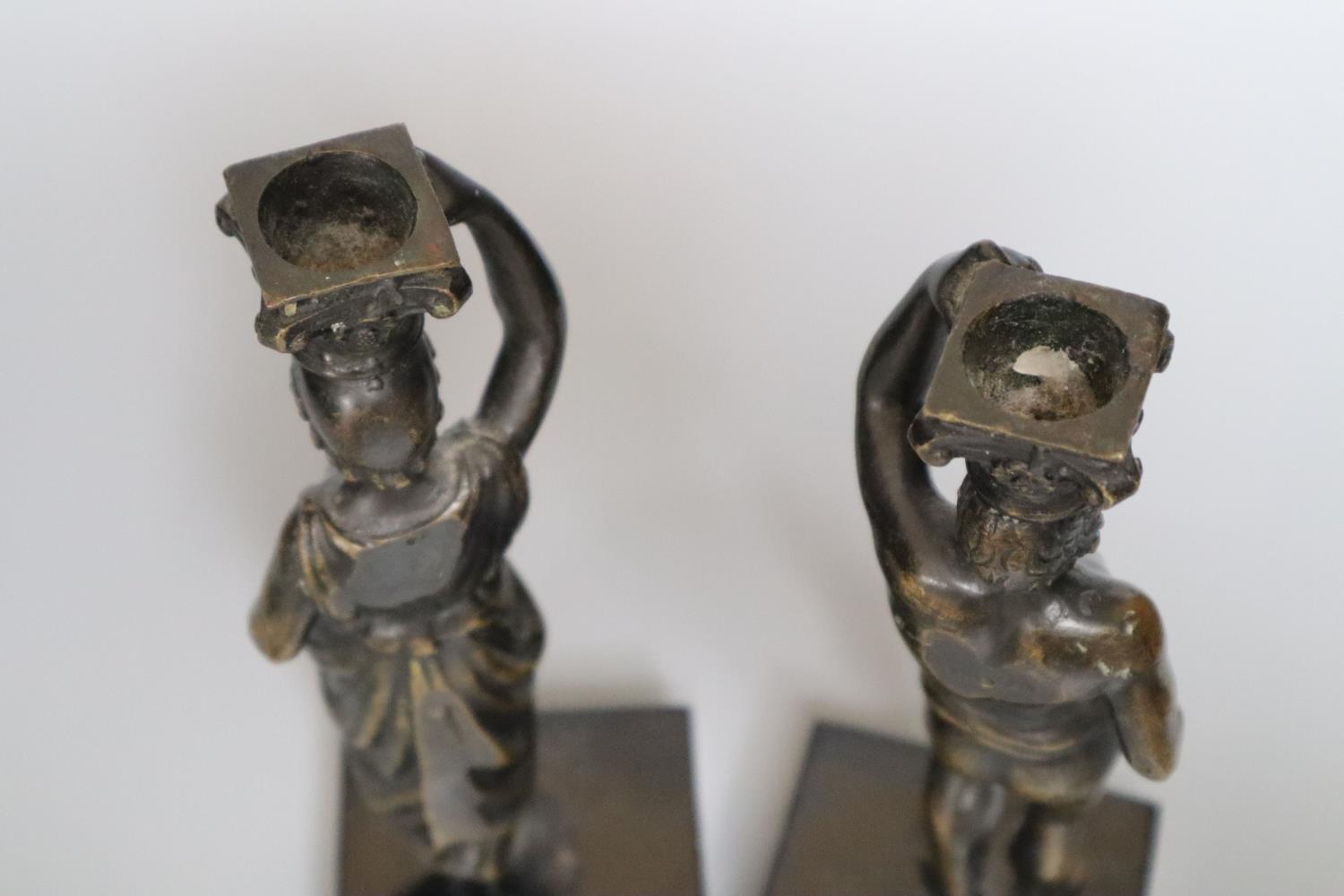 A pair of 19th century bronze figural candlesticks (once part of a clock), indistinctly stamped to - Image 3 of 3