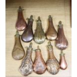 A group of ten Victorian copper / brass powder flasks