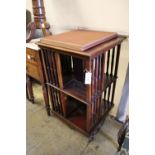 A late Victorian mahogany revolving bookcase, width 52cm, depth 52cm, height 84cm