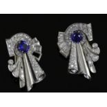 A pair of diamond and synthetic sapphire clips in white metal settings (tests as platinum), white