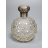 An Edwardian silver topped spherical hobnail cut glass scent bottle, Birmingham, 1907, height 12.