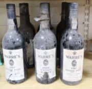 Nine bottles of Warre's vintage Port 1966 (1), 1977 (2), 1980 (2), 1983 (3) and one unknown year