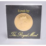 A Royal Mint QEII gold proof £100 one ounce coin.