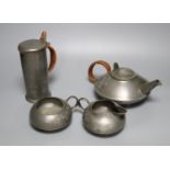 A Liberty's Tudric pewter three piece tea set, shape no.0231 and a Liberty's Tudric pewter