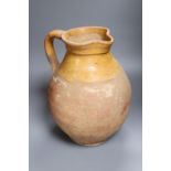 A Verwood earthenware jug, height 34cm