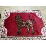 A North West Persian red ground 'Lion' rug, 176 x 142cm