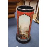 A Victorian earthenware pipe now as a stickstand, painted with landscapes and cock fighting