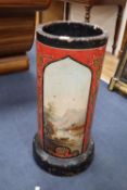 A Victorian earthenware pipe now as a stickstand, painted with landscapes and cock fighting