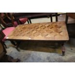 A Victorian walnut parquetry topped occasional table, width 50cm, depth 102cm, height 47cm