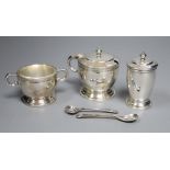 A modern cased silver three piece condiment set, with two later spoons, Wakely & Wheeler, London,