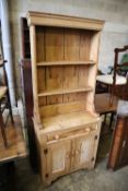 A Victorian style narrow pine dresser, width 76cm, depth 33cm, height 187cm