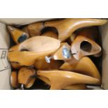 A collection of wooden shoe trees