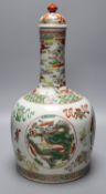 A Chinese famille rose 'dragon and phoenix' bottle vase and cover, 42cm