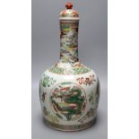 A Chinese famille rose 'dragon and phoenix' bottle vase and cover, 42cm