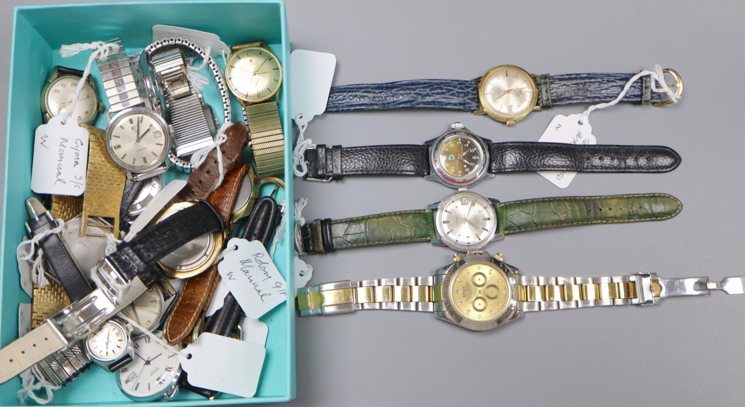 Eighteen assorted gentleman's wrist watches, including MuDu, Bulova, Elgin, Junghans and Cyma, a
