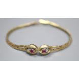 A modern 9ct, two stone ruby and two stone diamond set bracelet, 18cm, gross 8.2 grams.
