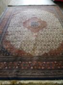 A large Persian carpet, 400 x 300cm