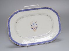 A late 18th century Chinese export octagonal meat dish, painted with monograms JL, 25cm