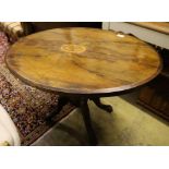 A Victorian inlaid walnut oval topped tea table, width 104cm, depth 72cm, height 71cm, no bolts