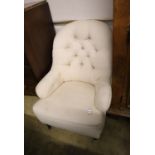 A Victorian upholstered spoonback armchair