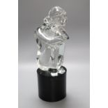 A Murano glass sculpture of a female seated on a black cylindrical glass plinth, signed L. Rosici,