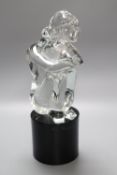 A Murano glass sculpture of a female seated on a black cylindrical glass plinth, signed L. Rosici,