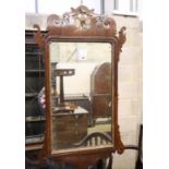 A George III style mahogany fret frame wall mirror, width 52cm, 93cm high