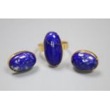 A Middle Eastern yellow metal and lapis lazuli oval dress ring, size N, and pair of matching