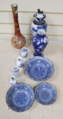 A graduated set of three Chinese porcelain blue and white bowls, largest 19cm and a group of four