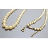 A single strand graduated cultured pearl necklace with 9ct barrel clasp, 39.5cm.