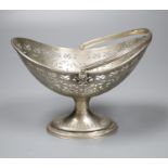 A Victorian pierced silver sugar basket, (lacking liner), The Barnards, London, 1873, height 12cm,