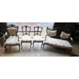 A late Victorian upholstered four piece salon suite, settee 133cm wide, 87cm high