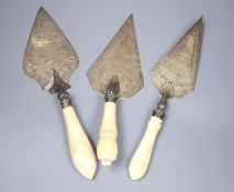 Two Victorian ivory handled silver presentation trowels, one a.f. and a similar plated trowel.