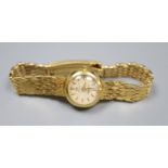 A lady's 1960's Omega Ladymatic wrist watch, on an 18ct gold bracelet with expanding clasp, gross