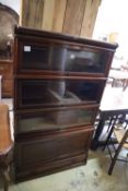 An early 20th century mahogany Kenrick Jefferson four section bookcase, width 86cm, depth 32cm,