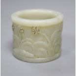A Chinese pale celadon jade archer's thumb ring