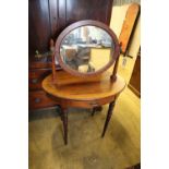 Early 20th century oval mahogany dressing table, width 85cm, depth 59cm, height 130cm