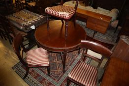 An early 20th century mahogany centre table, 105cm diameter together with four early Victorian