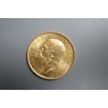 A George V 1925 gold sovereign, South Africa mint.