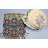 An early 20th century beadwork purse and an unmounted baby bonnet
