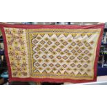 A 1920's large Egyptian-style embroidered wall hanging and a similar smaller hanging, 240 x 122cm (
