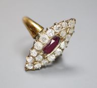 A yellow metal, ruby and diamond cluster set marquise shaped dress ring, shank has been cut and