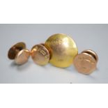 A set of three George V 9ct gold dress studs and one similar larger stud, gross 2.3 grams.