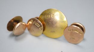 A set of three George V 9ct gold dress studs and one similar larger stud, gross 2.3 grams.