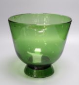 A green glass deep footed bowl, 25cm