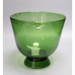A green glass deep footed bowl, 25cm