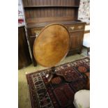 A Georgian and later circular mahogany tilt-top table, 53cm diameter, height 68cm