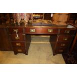 A reproduction mahogany military style pedestal desk, width 138cm, depth 69cm, height 76cm