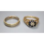 A Middle Eastern three colour metal ring and 9ct gold gem set ring, gross 2 grams.